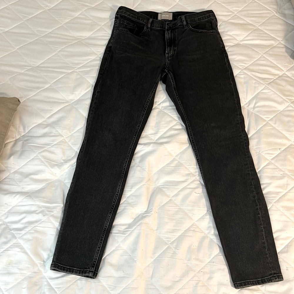 Mid rise black wash jeans.